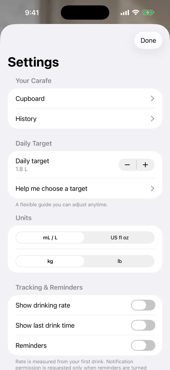 Carafe Settings screen with target, unit, reminder, and display controls.